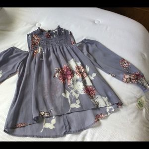 Blouse new with tags. Perfect for spring